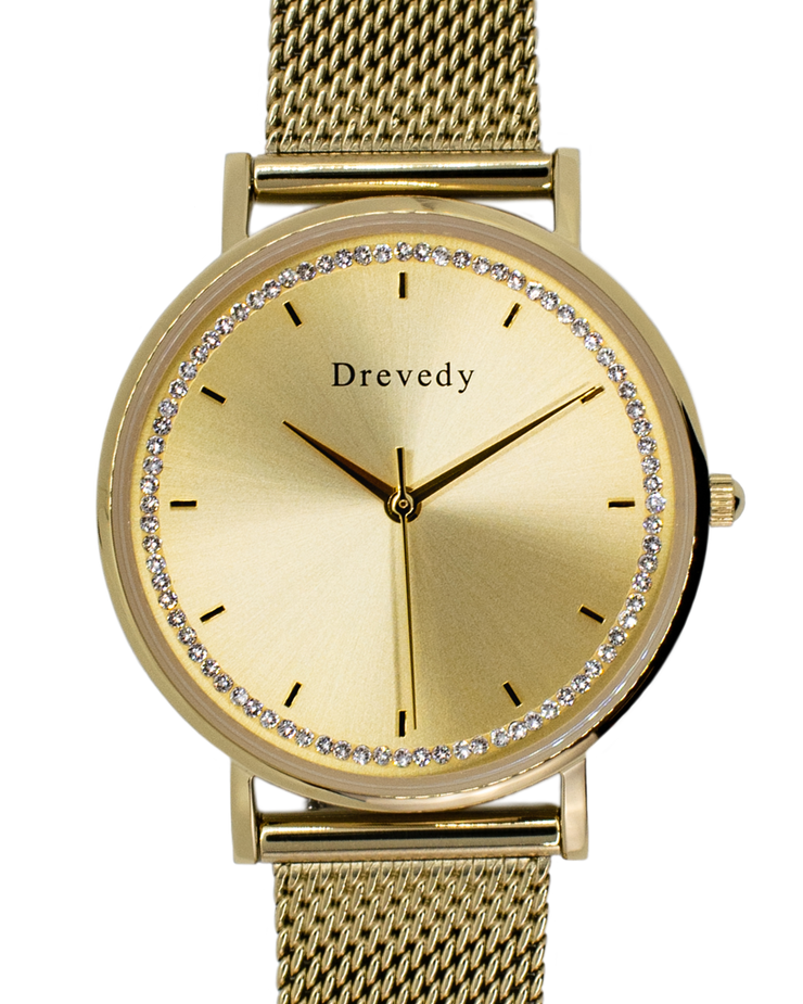 Gold watch. Pearl shell. Crystals. Mesh strap. Feminine. Classy.