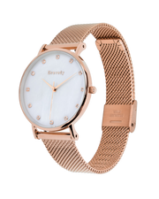 Rose gold watch. Pearl shell. Crystals. Mesh strap. Feminine. Classy.