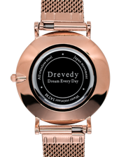 Rose gold watch. Pearl shell. Crystals. Mesh strap. Feminine. Classy.