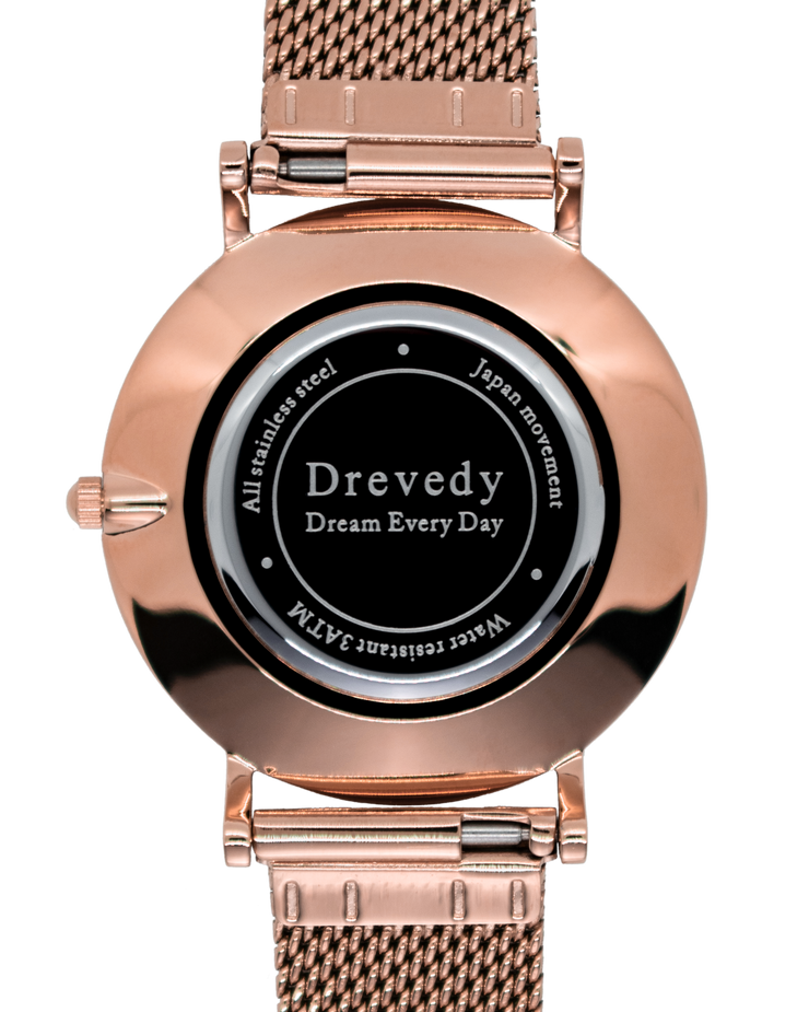 Rose gold watch. Pearl shell. Crystals. Mesh strap. Feminine. Classy.