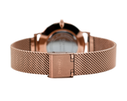 Rose gold watch. Pearl shell. Crystals. Mesh strap. Feminine. Classy.