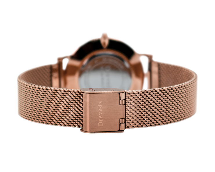 Rose gold watch. Pearl shell. Crystals. Mesh strap. Feminine. Classy.