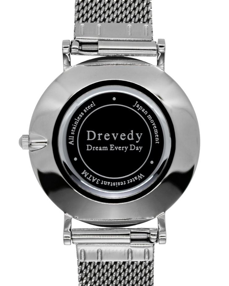 Silver watch. Pearl shell. Crystals. Mesh strap. Feminine. Classy.